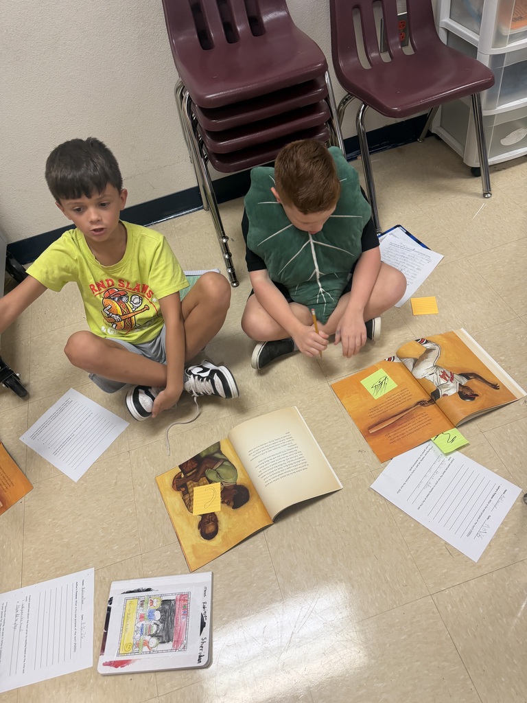 4th graders diving into reading.