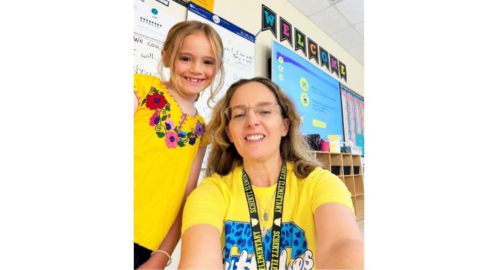 Riley and Mrs. Smith showing their support.