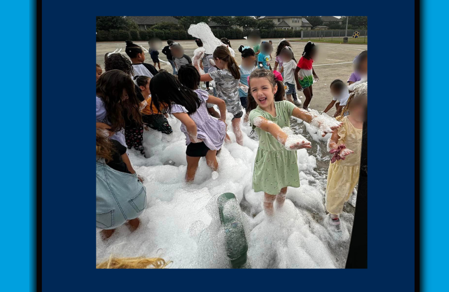 Students enjoying the bubble machine at the last Dojo party of the year.