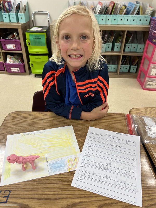 2nd graders sharing their writing creations