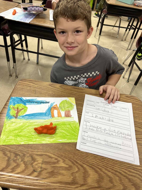 2nd graders sharing their writing creations