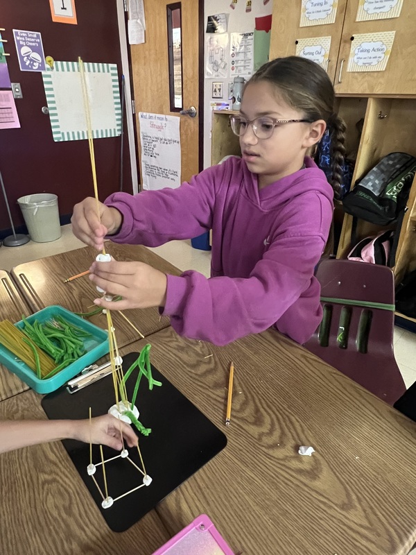 2nd graders creating new materials