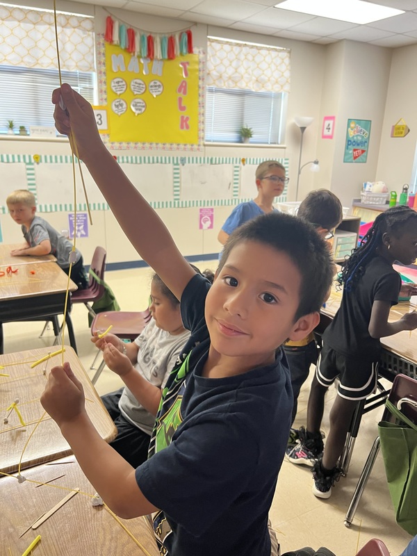 2nd graders creating new materials