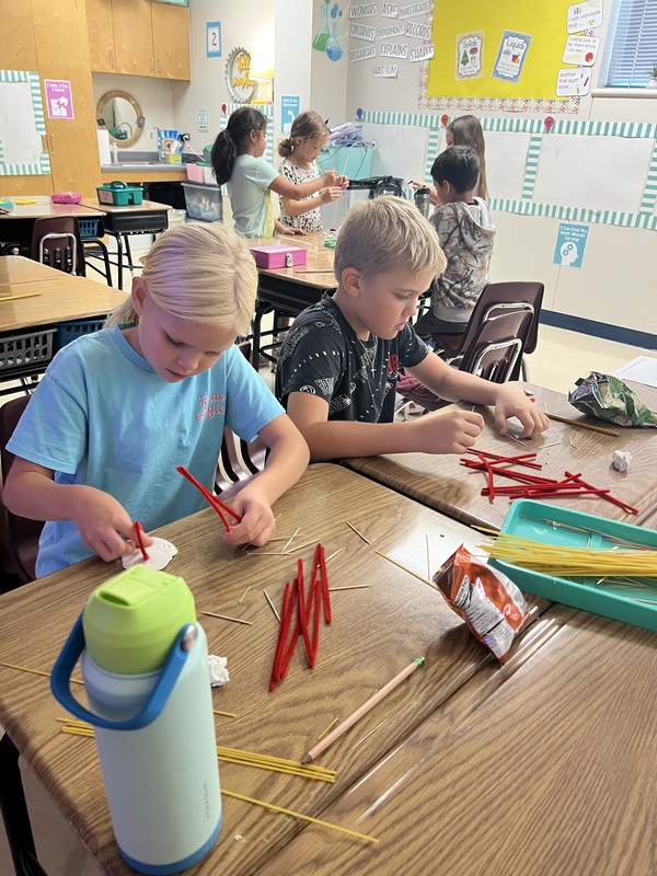 2nd graders creating new materials