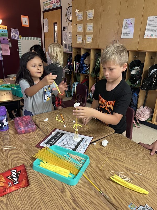 2nd graders creating new materials