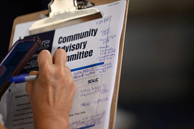 CAC members took copious notes during the tour of Clemens HS
