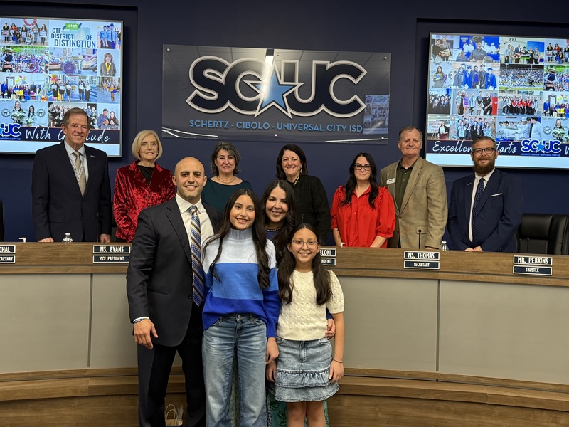 MIguel Gonzales was joined by his wife and children after being announced as the principal of Samuel Clemens HS