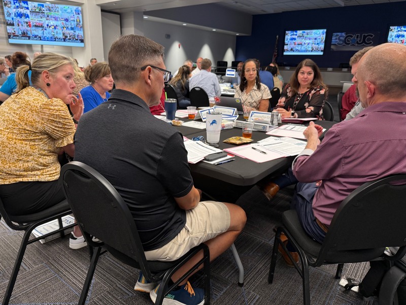 OSC members were divided into seven tables to discuss potential cuts to departments and programs.
