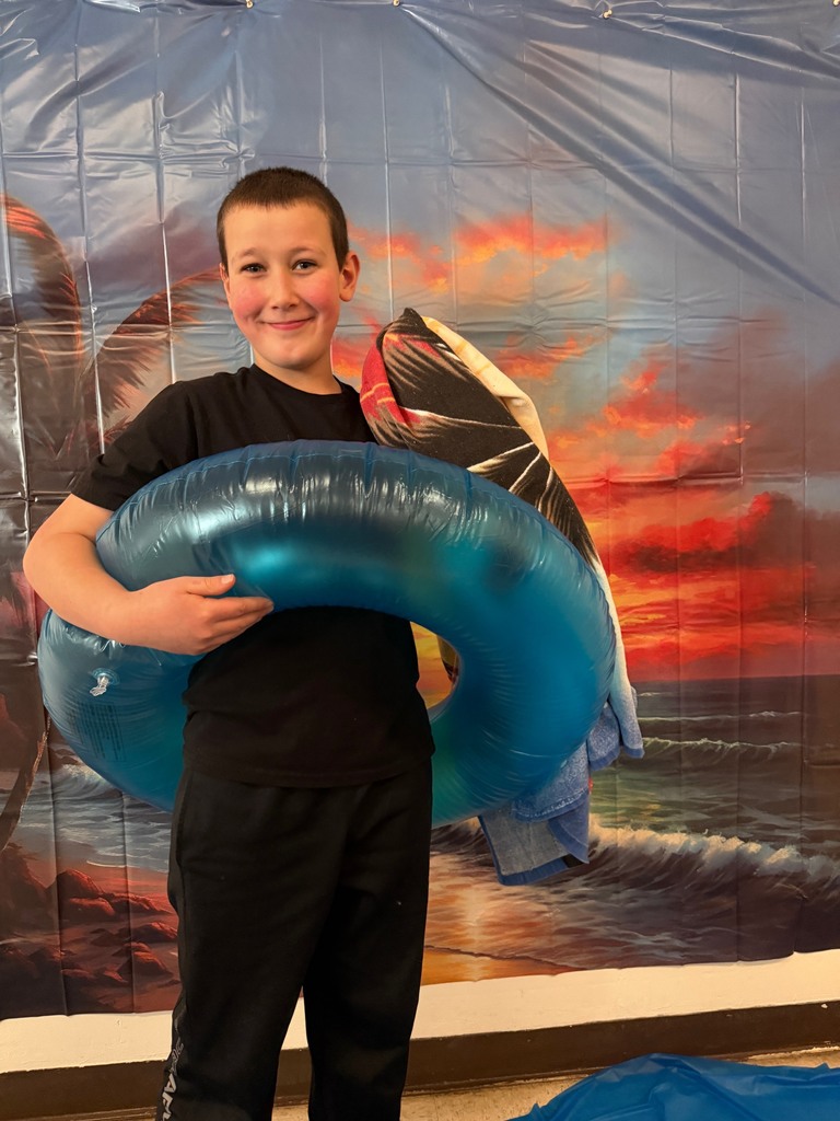 studentsposing at the beach