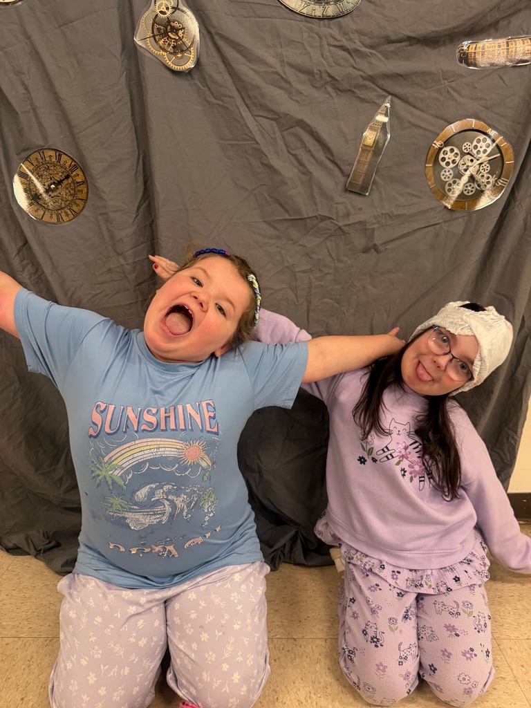 students posing at the beach