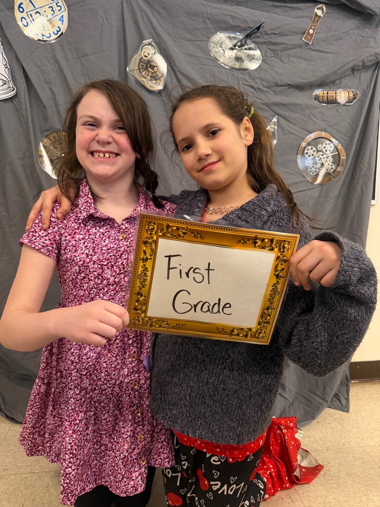 students posing at the beach