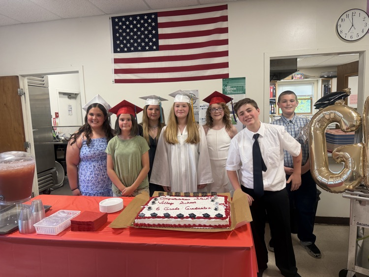 graduating students and cake o