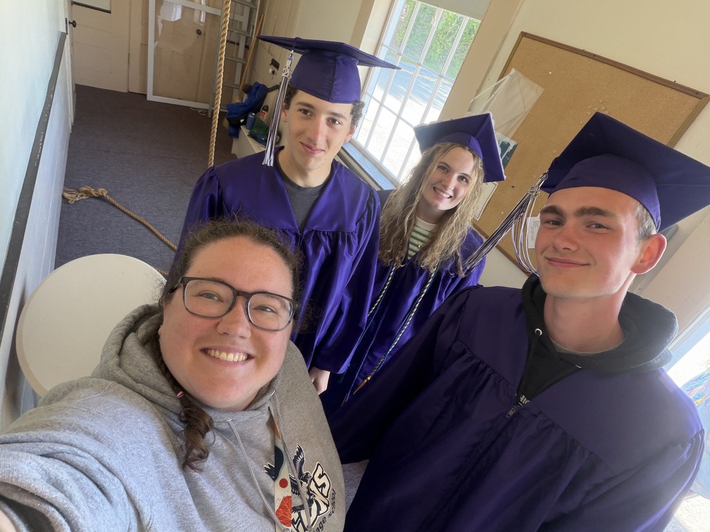 Graduating seniors and teacher selfie