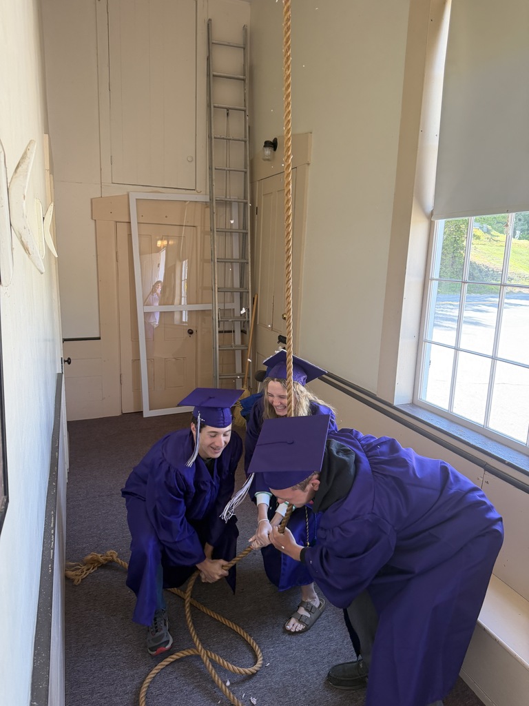 graduating seniors ringing church bell