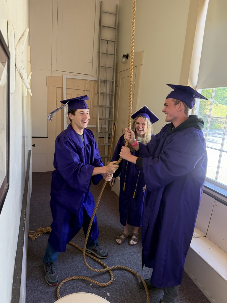 graduating seniors ringing church bell