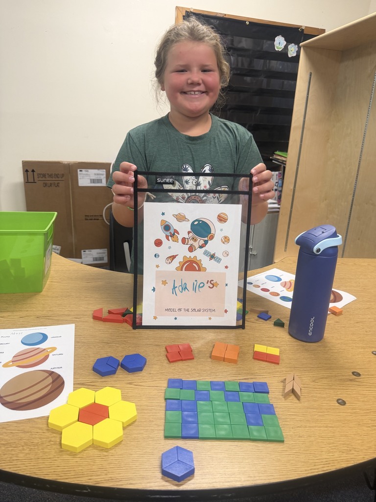 studentswith model of planets