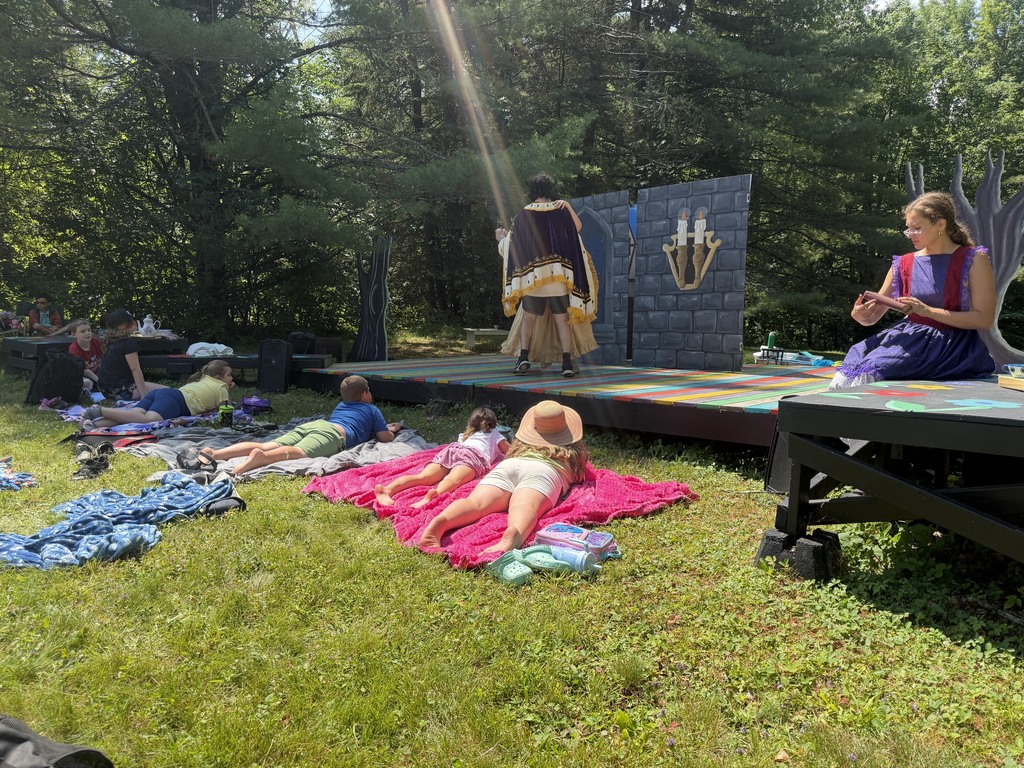 students watching a play