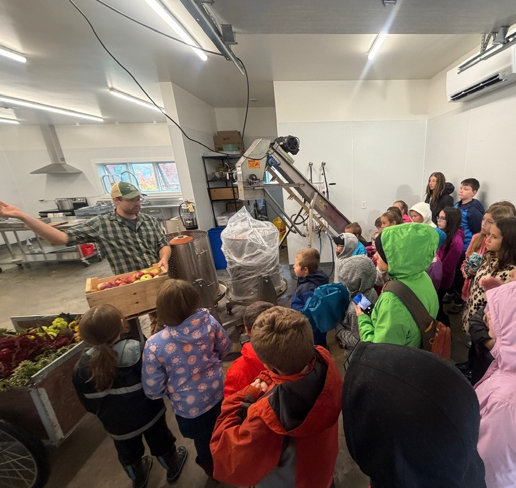 students learning about cider
