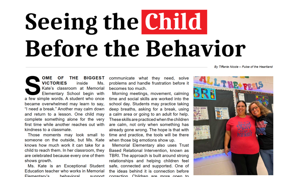 Two female educators smiling together next to classroom bulletin boards in an article titled "Seeing the Child Before the Behavior"