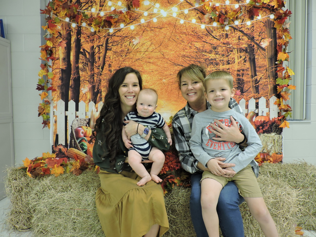 parents/guardians with students at Thanksgiving Luncheon