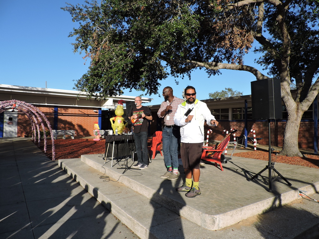 Mr. Julien and Mr. Pacheco performing the Hula