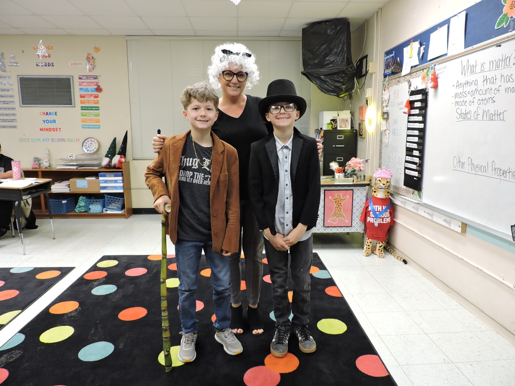 Mrs. Appel and students dressed up for the 100th day of school