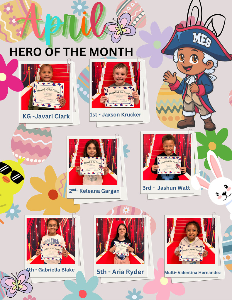 A colorful digital graphic celebrating the April "Hero of the Month" students at Memorial Elementary School. The background features pastel-colored flowers, Easter eggs, and a cartoon character dressed in a blue and red colonial-style outfit with bunny ears. Seven student photos are arranged in a collage, each holding a "Student of the Month" certificate while standing on a red carpet. The students are labeled by grade: KG - Javari Clark, 1st - Jaxson Krucker, 2nd - Keleana Gargan, 3rd - Jashun Watt, 4th - Gabriella Blake, 5th - Aria Ryder, Multi - Valentina Hernandez. The title "April Hero of the Month" is displayed in large, playful letters at the top. Various decorative elements, including a smiling chick with sunglasses and butterflies, surround the students' photos.