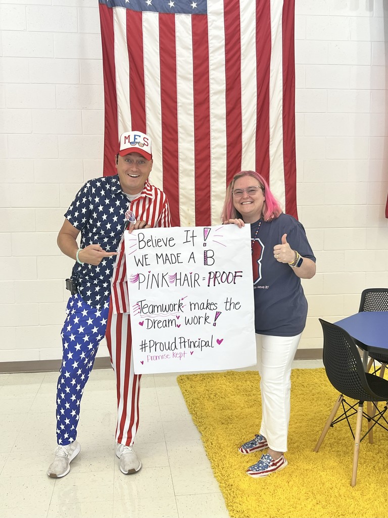MES Admin dressed and ready in Red, White and Blue and Pink Hair at the Energy Bus Assembly