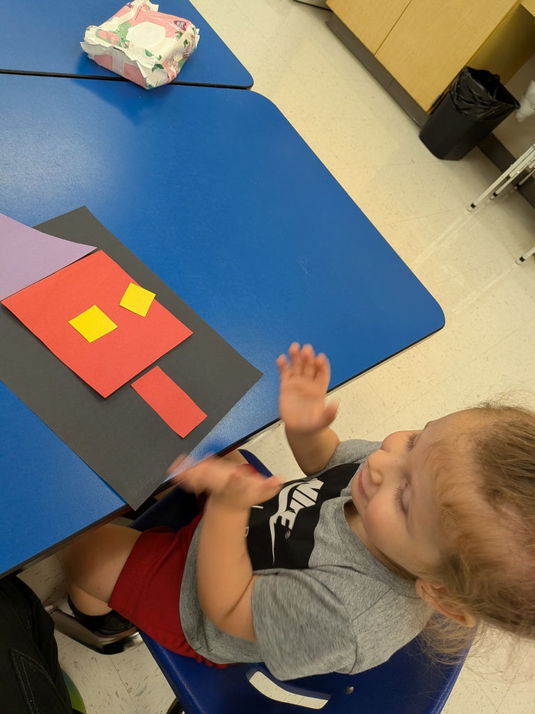 Students working hard with shapes and Mat Man