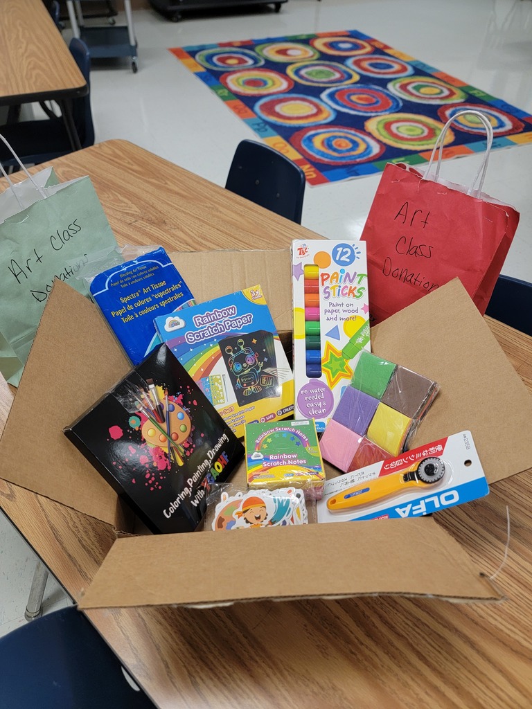 Basket of Art supplies for our Art Class - paint , cutter, etc