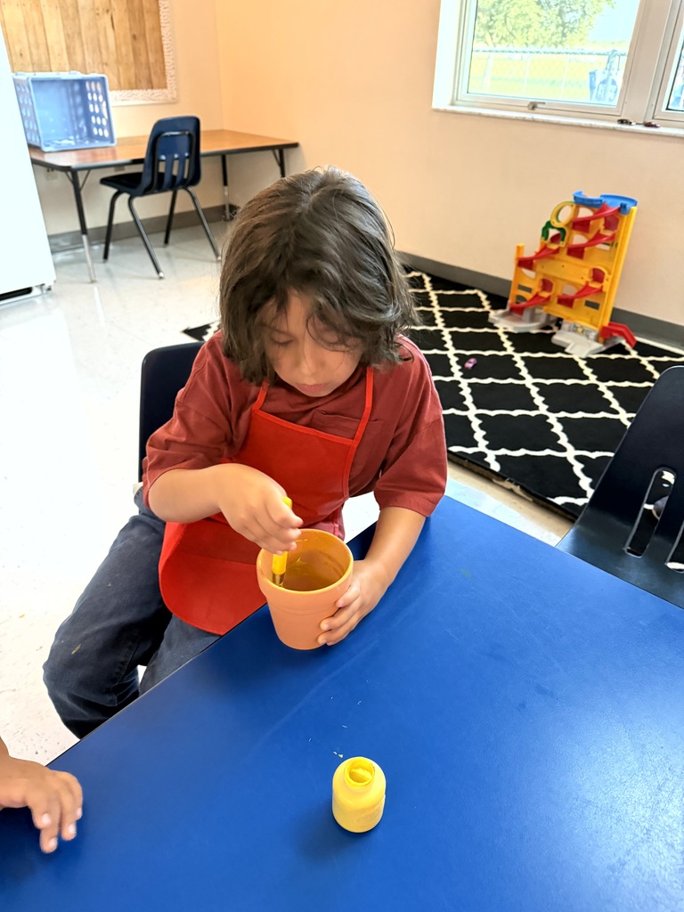 Mrs. Godfrey's class learning about difference between animals and plants with some fun activities.