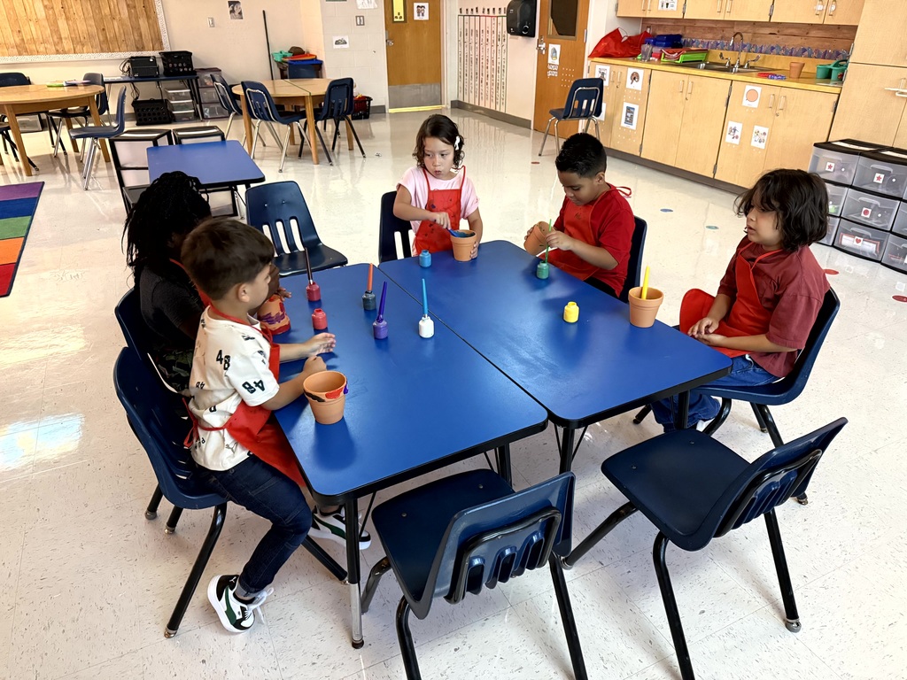 Mrs. Godfrey's class learning about difference between animals and plants with some fun activities.