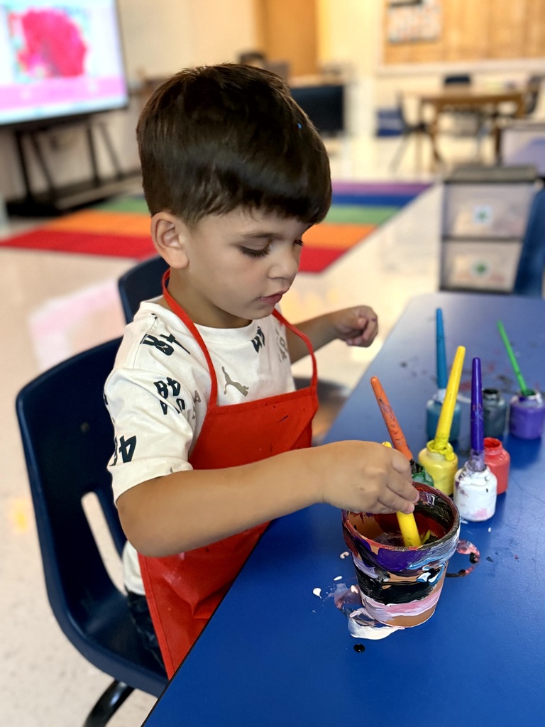 Mrs. Godfrey's class learning about difference between animals and plants with some fun activities.