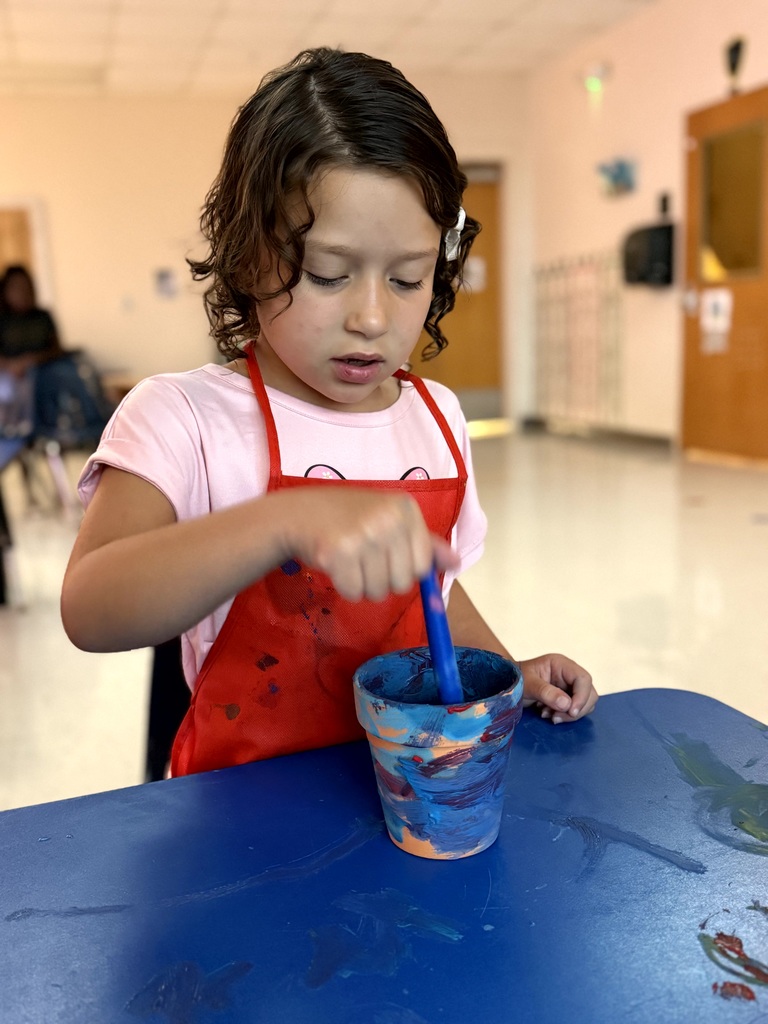 Mrs. Godfrey's class learning about difference between animals and plants with some fun activities.