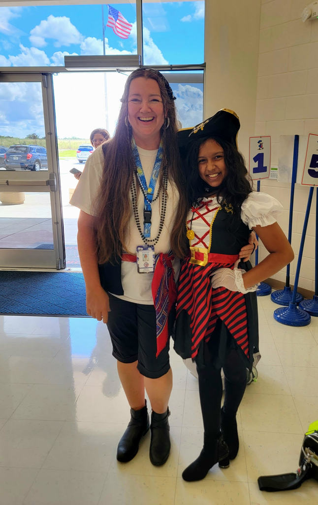teacher with students dressed up as pirates