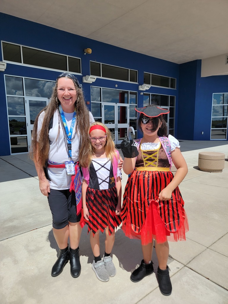 teacher with students dressed up as pirates