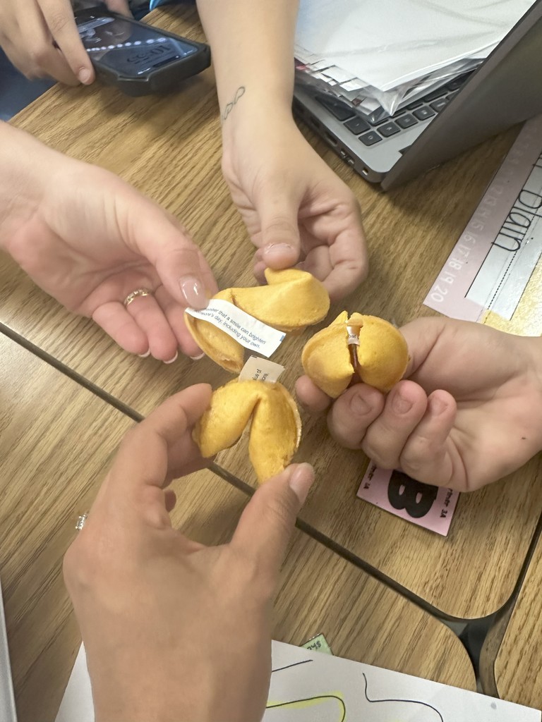 2nd graders celebrating the end of their Knowledge Unit ; Fortune Cookies