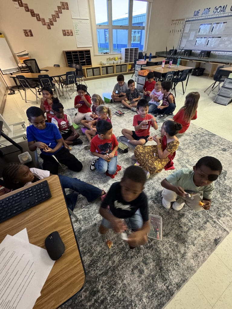 2nd graders celebrating the end of their Knowledge Unit 