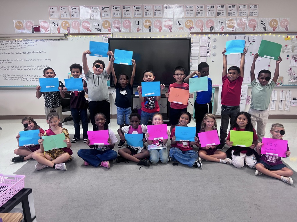 2nd graders celebrating the end of their Knowledge Unit 