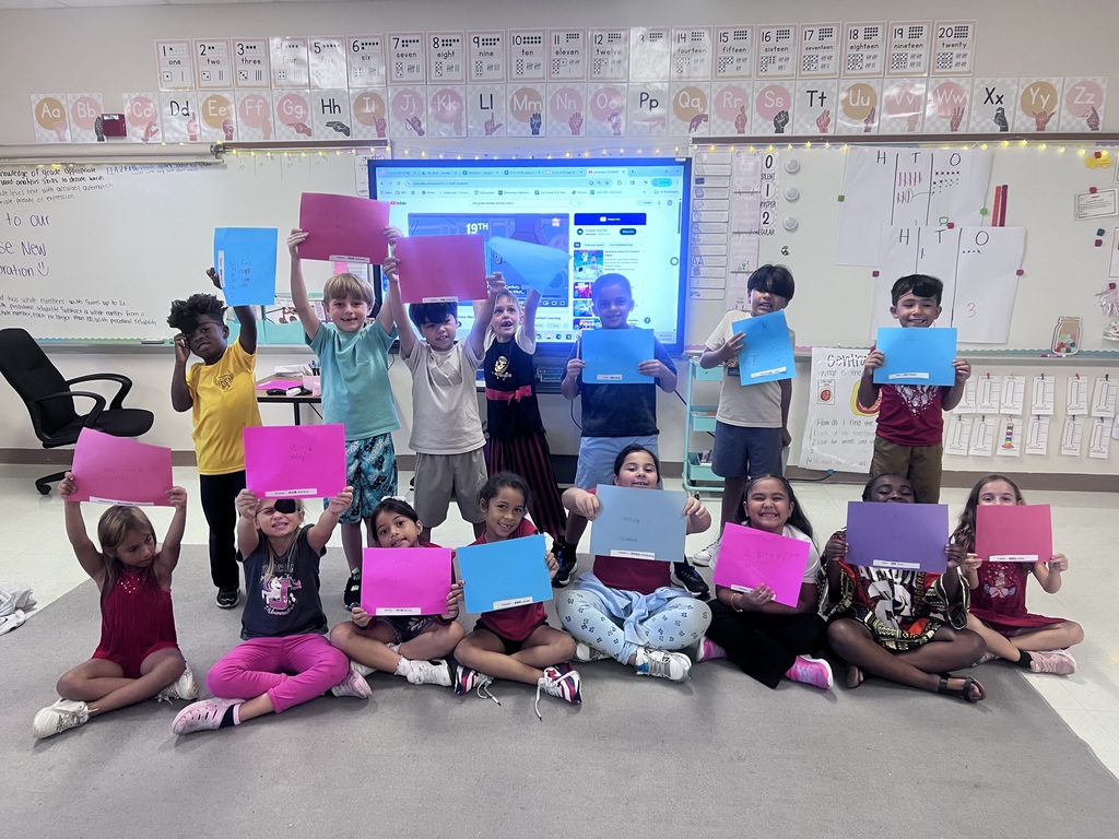 2nd graders celebrating the end of their Knowledge Unit 