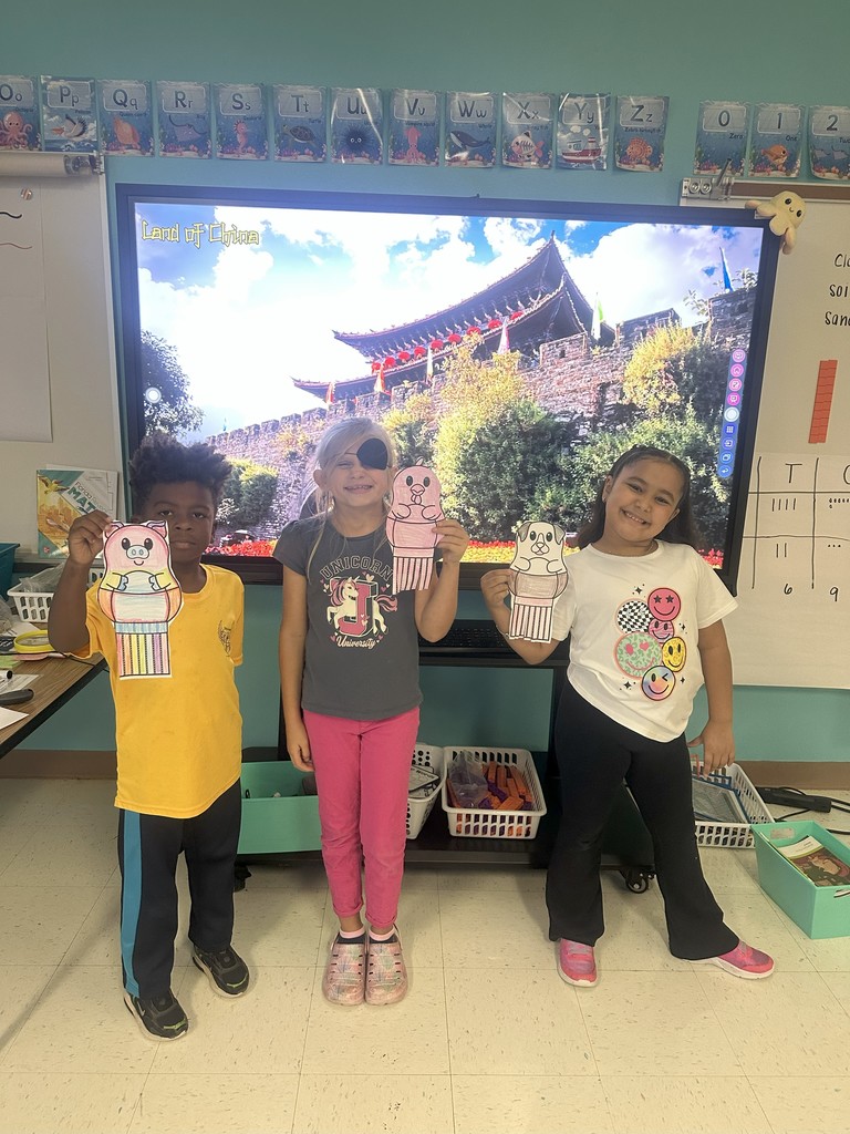 2nd graders celebrating the end of their Knowledge Unit 