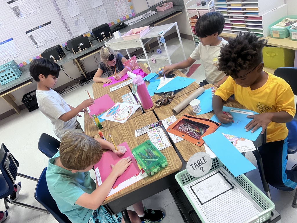 2nd graders celebrating the end of their Knowledge Unit 
