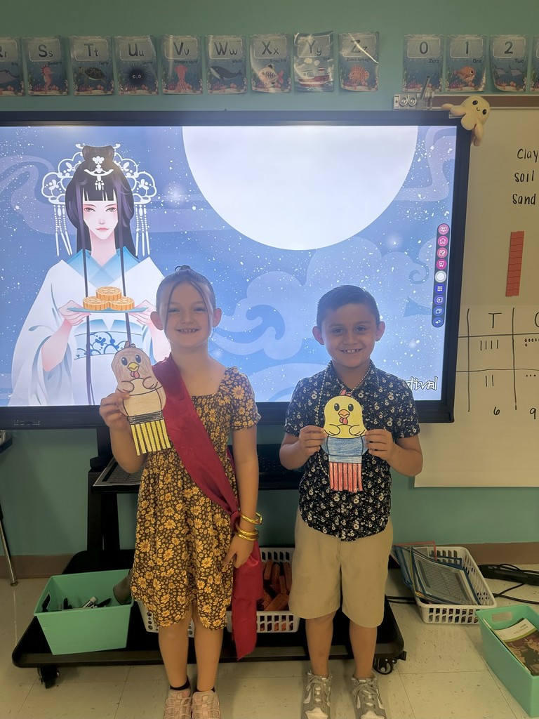 2nd graders celebrating the end of their Knowledge Unit 