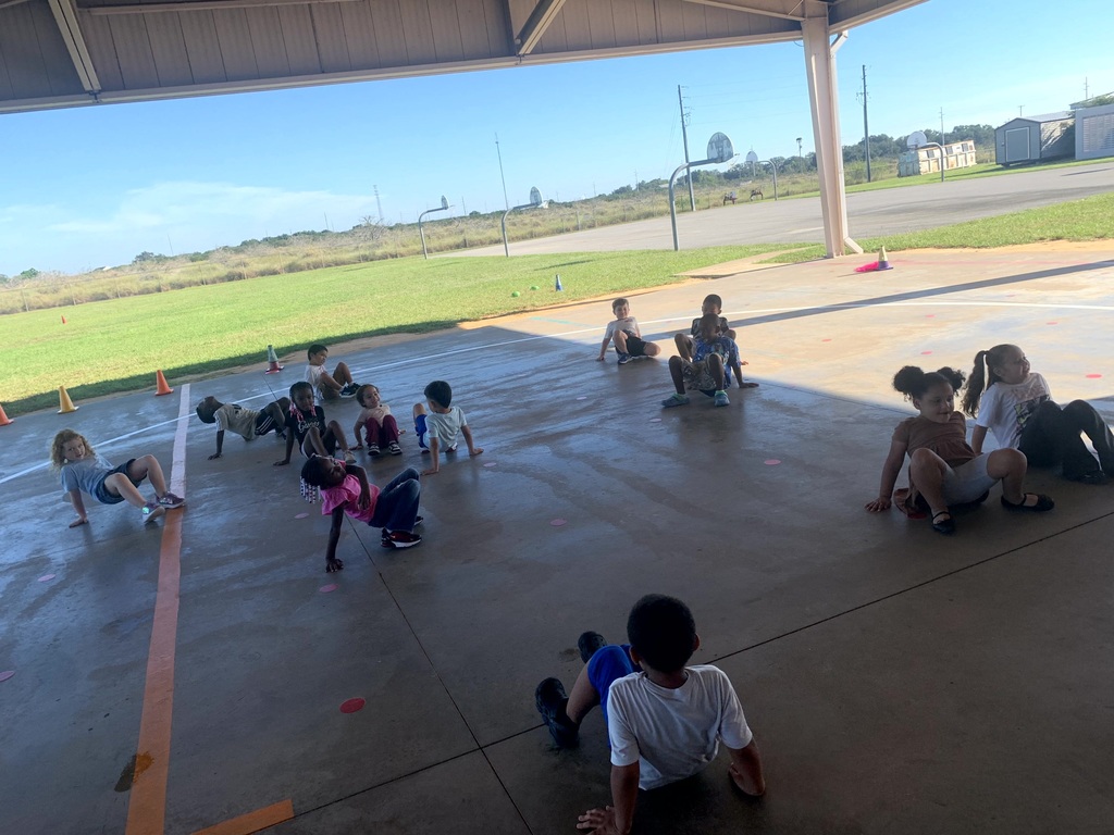 MES Students at PE doing the Constitution Obstacle Course with throwing, catching and much more.