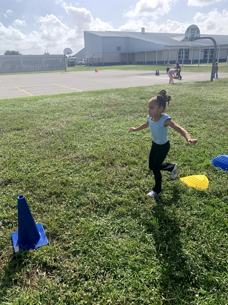 MES Students at PE doing the Constitution Obstacle Course with throwing, catching and much more.