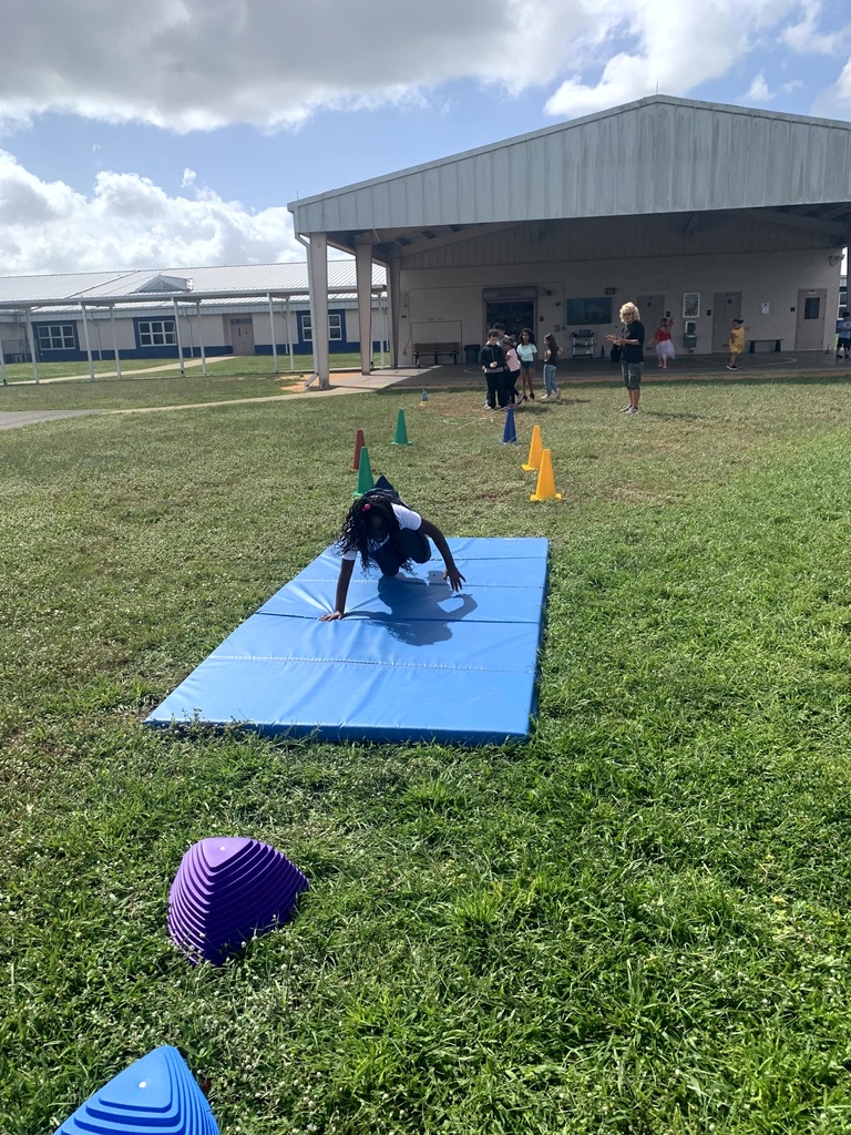 MES Students at PE doing the Constitution Obstacle Course with throwing, catching and much more.