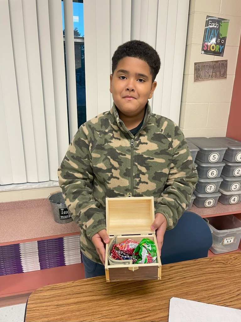 Picture of Nick our Day 2 winner holding his Treasure Chest.