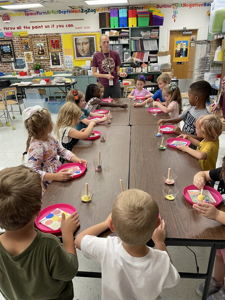 Picture of Pre-K class working on their tile art.