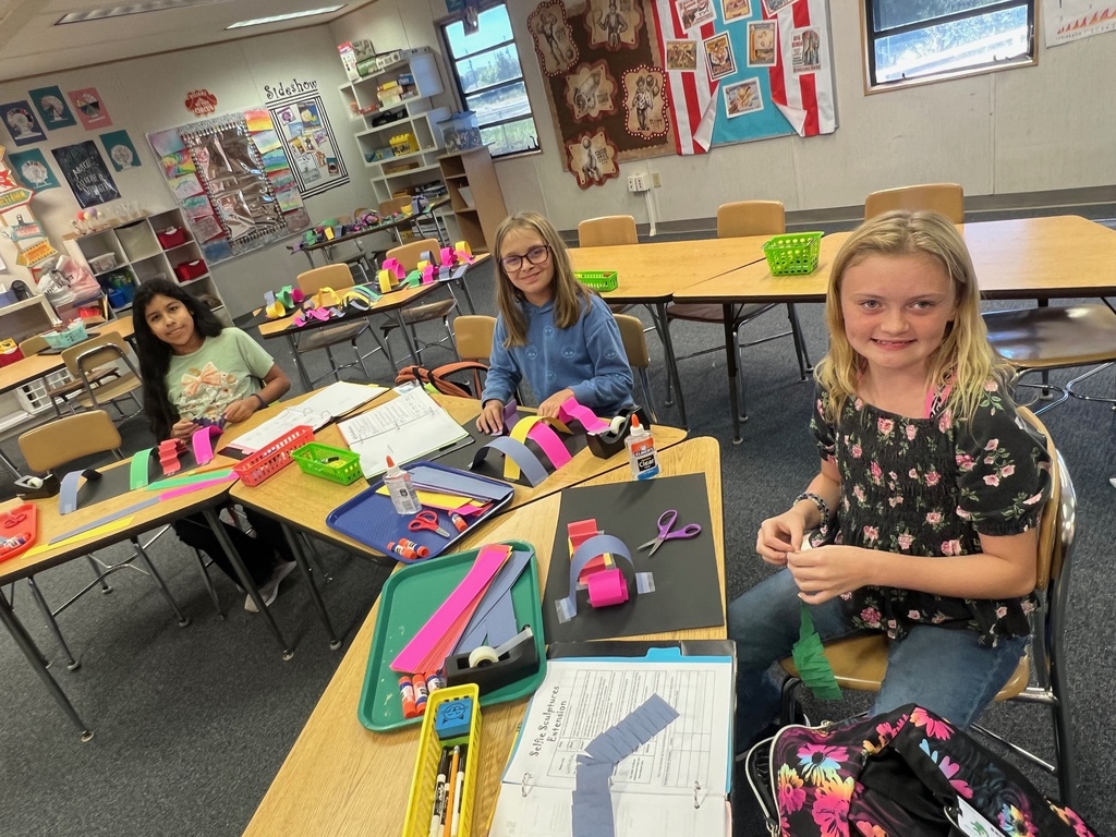 Gifted students working on building activity