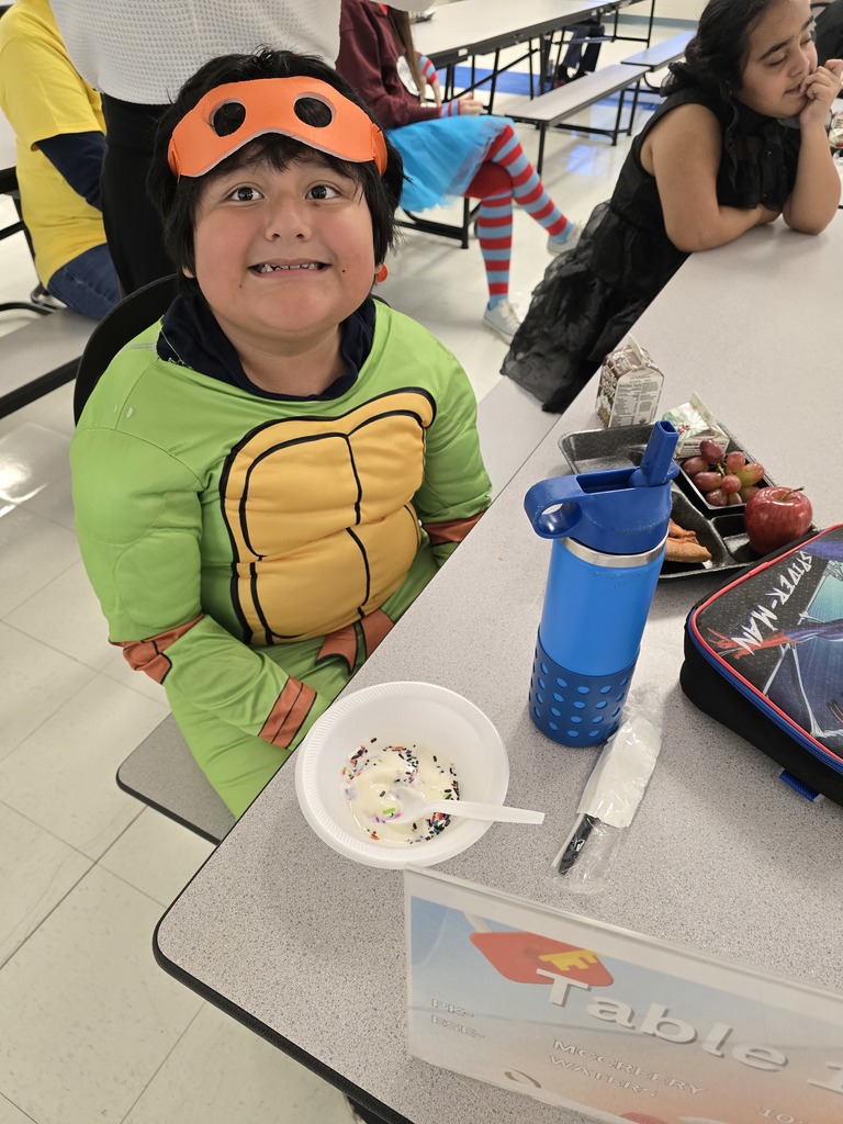 Students enjoying ice cream during the PBIS reward event.